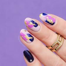 12 Brilliant Foil Nail Designs To Try This Weekend Fall nail art with gold foil.