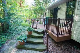 Choose from the exceptional finishes of gravel path, havana gold, island mist, lava rock, rope swing, spiced rum, tiki torch, and vintage lantern. Cozy Transcend Tiki Torch Deck Ann Arbor Decks By Jmj