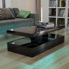 Designed for use in heavy wear environments, the table can withstand the weight of people dancing on it but is equally suited at home. Tiffany Black High Gloss Rectangular Coffee Table With Led Lighting Furniture123