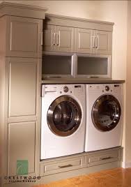 Pin By Jackie Madsen On Mudrooms Laundry Storage Kitchen And Bath Showroom Laundry Room Cabinets Laundry Room