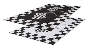 Outdoor mats and rugs for camping, rv use, and patios are usually made of woven plastic that is weatherproof, easy to clean, lightweight, and super they even have a hunter pattern with different animals on it that comes in 2 different colors and has the 9'x12′ options as well as a smaller 6'x9′ option. Faulkner 48709 Reversible Rv Outdoor Patio Mat Black White Checkered Finish Line Design 8 X