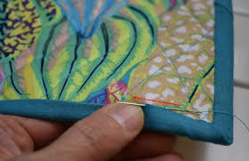 There are four seasons in a year: Binding The Hot Stuff Silicone Potholder Trivet Around The Bobbin