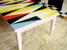 Whether your style is scandinvanian or modern, this table is a great place for your candles and plants. Painted Funky Coffee Table