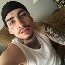 Face tattoos and blood lead to Halifax gas station robber: 'I need money!  Give me money'