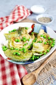 Add chopped onion, pepper, chili powder, tomato sauce, and oregano to simmering chicken. Easy Braised Iceberg Lettuce With Peas Transform Lettuce From Boring To Wow