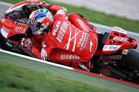 Catalunya Motogp Casey Stoner Takes First Pole Of Season Bridgestone Triumph Motorcycles Motogp