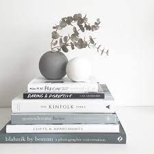 A carefully selected stack of books and magazines that you can look through will add color, texture and a personal touch to your living room, while candles allow you to create a cozy ambience. Justine Ash Stylist On Instagram On The Shelf Xo Coffee Table Books Decor Kinfolk Table Decorating Coffee Tables