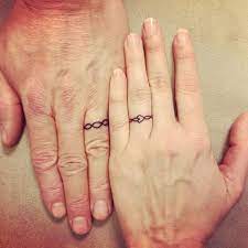 40 Awesome Wedding Band Ring Tattoos Tattoo Wedding Rings Wedding Band Tattoo Wedding Ring Finger Tattoos