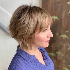 Medium white blonde feathered hairstyle. 8 Best Hairstyles For Women Over 50 To Look Younger In 2021 Hairstyles Weekly