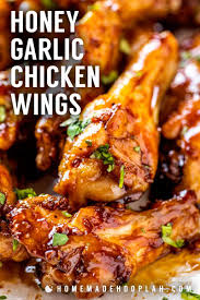 Honey Garlic Chicken Wings These Honey Garlic Chicken Wings Are Baked In The Oven Chicken Wing Recipes Chicken Wing Recipes Baked Garlic Chicken Wings Recipe