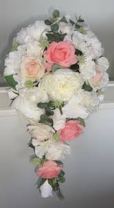Coral wedding decorations coral wedding themes coral wedding flowers wedding flower arrangements flower bouquet wedding wedding whimsical teal and coral wedding ideas | every last detail. Bridal Shower Bouquets Teardrop Wedding Bouquets The Floral Touch Uk