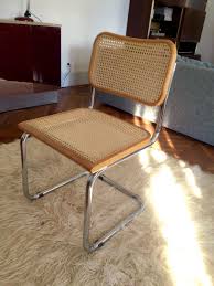 Poul kjaerholm, chaise pk 24, 1965, acier plat chromé, moelle de rotin tressée, cuir inv. Chaise Cesca B32 Marcel Breuer Luckyfind