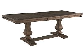 No fuss neutrals are words to live by! Johnelle Extendable Dining Table Ashley Furniture Homestore