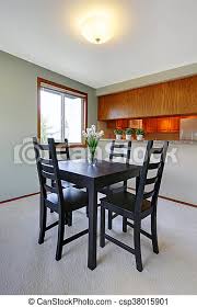 Complete your dining room or kitchen with a modern dining table. House Interior Simple Black Dining Table Set In Small Dining Room With View Of The Kitchen House Interior Simple Black Canstock
