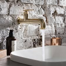 Whether you're after an industrial style kitchen with a feature tap like a spring neck kitchen mixer, or a minimalist modern kitchen with a clean and simple goose neck mixer, renovator store has a kitchen faucet to suit your style. Crosswater Union Brushed Brass Wall Mounted 1 Tap Hole Basin Mixer Sanctuary Bathrooms