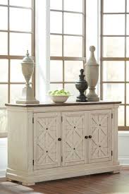 They can be as simple as a bar cart or as grand as a dining room storage cabinet. Bolanburg Servers By Ashley Marlo Furniture Marlo Furniture
