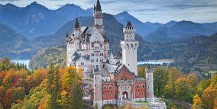 Its majestic towers and turrets stretch up into the sky flanked by white and gray toned walls and elegant fortifications are reminiscent of the famous sleeping beauty castle at disneyland. Neuschwanstein Castle Expert S Guide On Visiting The Fairy Tale Castle Hotelscombined Neuschwanstein Castle Expert S Guide On Visiting The Fairy Tale Castle