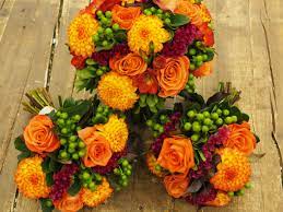 Shop proflowers® today & deliver fresh flowers, gourmet gift baskets or an indoor plant! Fall Colored Bridal Bouquet Orange Roses Chrysanthemums Hypericums Celosias And Smoke Bu Chrysanthemum Bouquet Chrysanthemum Wedding Bouquet Bridal Bouquet
