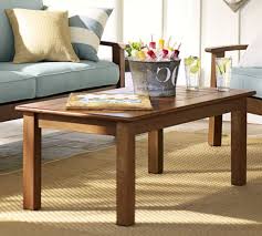 This practical wooden coffee table is specially designed for your living room. Chatham Fsc Mahogany Coffee Table Honey Pottery Barn