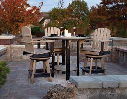 An outdoor counter height table contributes to a casual, contemporary ambiance, and makes for a more informal outdoor dining set than arrangements with traditional height dining tables. Amish Poly Outdoor Dining Set From Dutchcrafters Amish Furniture
