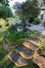 Amazing Ideas To Plan A Sloped Backyard That You Should Consider From leveled stairs to creeping plants, and even cascading waterfall installations, your hilltop slope is your chance to redefine the landscape upon which you reside. amazing ideas to plan a sloped backyard