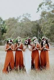 Try These Romantic Purple Wedding Ideas With Images Orange Bridesmaid Dresses Wedding Bridesmaids Burnt Orange Bridesmaid Dresses