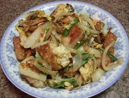 Fried Rice Cakes With Eggs Banh Bot Chien Recipe Petitchef Recipe Instant Pot Recipes Best Instant Pot Recipe Cabbage Recipes