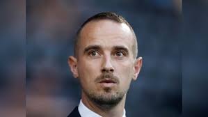 Football Association reaches financial settlement with former England  women's national football coach Mark Sampson