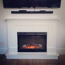 Is your electric fireplace plenty warm and romantic, but lacks a certain something that could take it up a notch in the aesthetics arena. Electric Fireplace Surround And Mantel Electric Fireplace Fireplace Fireplace Surrounds