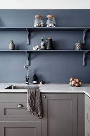With good care, your worktop will serve you a lifetime and can be sanded down and refinished to remove scratches (only enriching its appearance over time). Kitchen In Warm Grey And Petrol Blue Coco Lapine Design Grey Kitchen Walls Blue Kitchen Walls Home Decor Kitchen