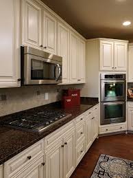 Baltic Brown Granite Counters With White Cabinets Antique White Kitchen Antique White Kitchen Cabinets Brown Granite Countertops