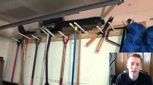 You can hang heavier tools with long handles on a pegboard too, but you can make a more solid, stable system for them by cutting holders out of pvc locate the studs on the wall where you want your pegboard tool holder. Garage Tool Rack Youtube