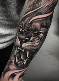 50 Eye Catching Lion Tattoos That Ll Make You Want To Get Inked Lion Tattoo Lion Tattoo Sleeves Lion Forearm Tattoos