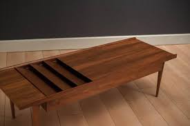 Neutral and functional addition for the living room, bedroom and others interiors as needed. Midcentury Walnut Magazine Rack Coffee Table At 1stdibs