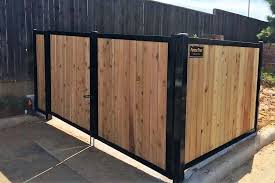 Build A Wood Fence With Metal Posts That S Actually Beautiful Cedar Wood Fence Metal Fence Panels Wood Fence Design
