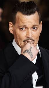 Johnny depp is perhaps one of the most versatile actors in recent years. Johnny Depp Is Coping With Yet Another Unfortunate Breakup Tattoo Vanity Fair