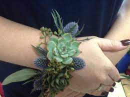 We did not find results for: Natural Wrist Corsage Of Succulents Blue Thistle And Seeded Eucalyptus Flowers By Tammy 423 636 1000 Greeneville Tn Wrist Corsage Corsage Prom Flowers