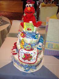 The Elmo Themed Diaper Cake I Made For My Cousins Surprise Baby Shower Baby Shower Inspiration Surprise Baby Shower Baby Diaper Cake