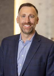 John P. Roland, Partner and Private Wealth Advisor