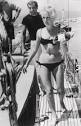 Actress Catherine Deneuve In Bikini by Bettmann