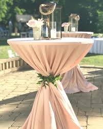 A very unique cocktail table setup! Blush Pink Cocktail Table For Outdoor Wedding Blushweddingdecorations Cocktail Party Decor Pink Wedding Decorations Wedding Cocktail Tables