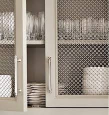 Sourcing guide for metal mesh panel: Poca Cosa Mesh Front Cabinetry Kitchen Cabinets Upgrade Refacing Kitchen Cabinets New Kitchen Cabinets