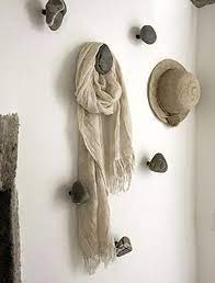 Need To Figure Out How To Make These Rock Hooks For My Future Lake House Home Diy Diy Hat Rack Wood Hangers