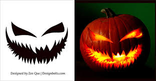 Scary pumpkin with a smile on a stump in green forest. 10 Free Scary Halloween Pumpkin Carving Patterns Stencils Ideas 2014