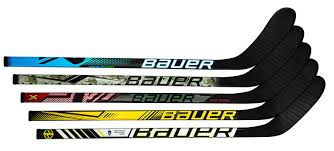 Inserting a plug into a hockey stick. Bauer Hockey Mystery Mini Stick Toys R Us Canada