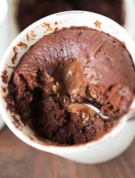 The Moistest Chocolate Mug Cake You Will Ever Have It S Not Spongy Like Other Mug Cakes Recipe On Tablefortwobl Moist Chocolate Mug Cake Mug Recipes Desserts
