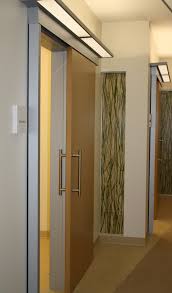 Barn Doors For Medical Facilities Office Fronts Aurora Doors Medical Office Design Medical Office Office Interior Design
