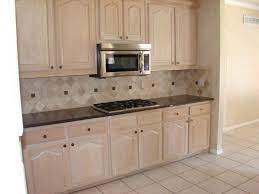 Using a pickling finish or pickling stain that is applied with the direction of the grain it achieves a slightly transparent white look with the grain of the wood still showing through. Kitchen Remodel Before After White Oak Kitchen Oak Kitchen Cabinets Country Kitchen Cabinets