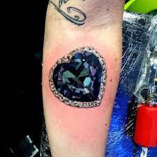 9 Insanely Creative And Stunning Jewel Tattoos With Images Gem Tattoo Jewel Tattoo Tattoos