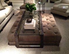 Place a pouf by a bed as a nightstand. 18 Ottoman Table Ideas Ottoman Table Table Coffee Table